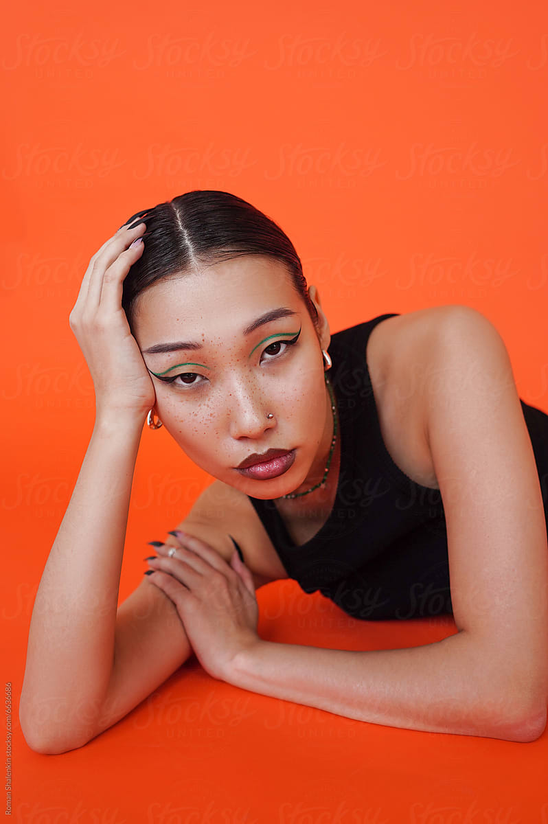 Portrait on orange backdrop